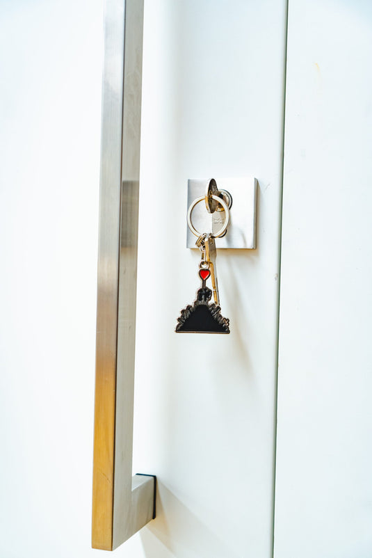 Metall Schlüsselanhänger - Kids On Guns