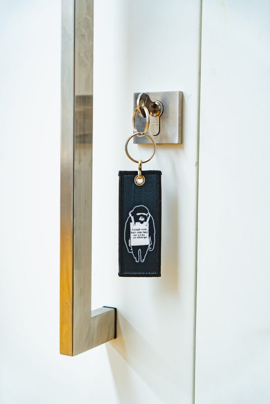 Stoff Schlüsselanhänger – Laugh Now